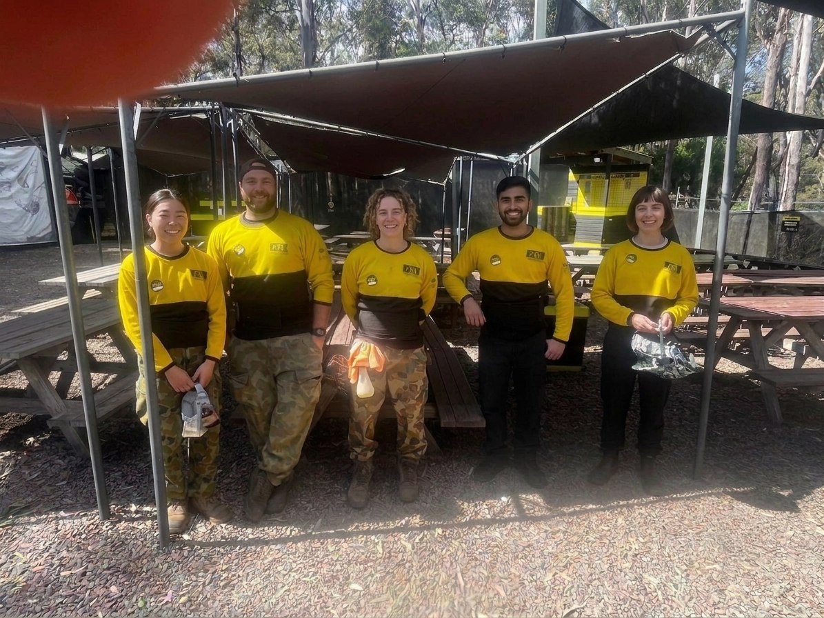 A smiling Delta Force marshal team ready for the day's sessions